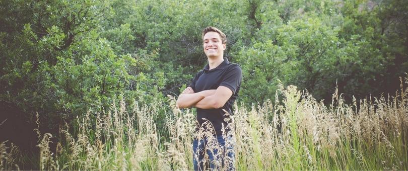 Jonah standing in a field