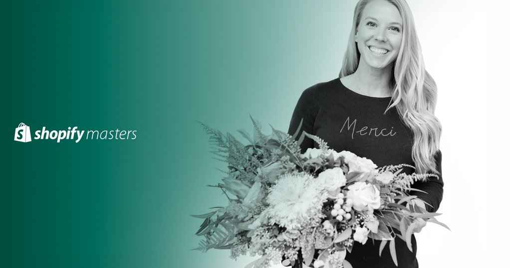 Founder of Bonjour Fete, Rachel Huntington with a bouquet of flowers.