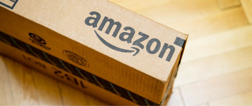 Cardboard box with Amazon logo on it